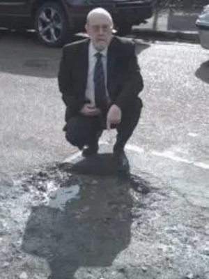 Tom McNeice with pothole