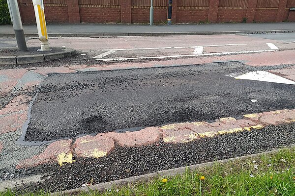 One of the speed bumps on Brook Road