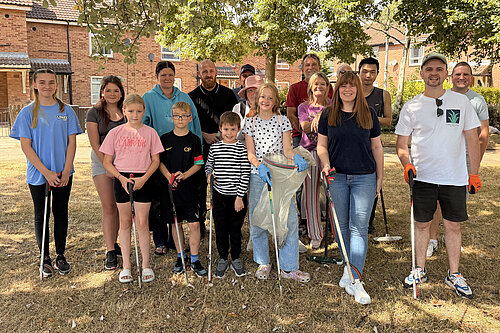 East Marsh residents, children and volunteers taking part in a community clean-up around Victor Street.