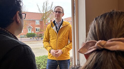 Ian talking to local residents