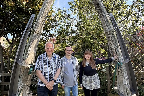 East Marsh Liberal Democrat councillors Steve Beasant, Loyd Emmerson and Nicola Aisthorpe standing beneath the historic whale jawbones at Your Place Grimsby.