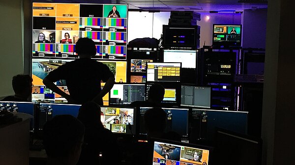 Screens showing Lib Dem Conference