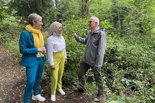 Raihaanah Ahmed and John Hale with Daisy Cooper