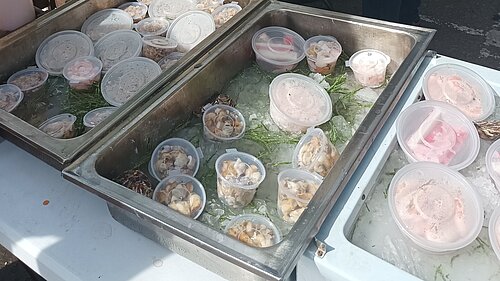 Cockles, whelks, prawns, mussels on seafood stall