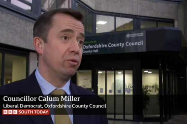 Councillor Calum Miller giving an interview to the BBC outside County Hall, Oxford
