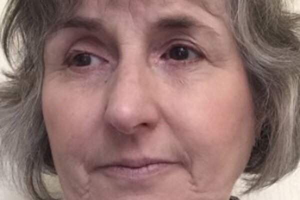 a headshot of Imogen Beattie