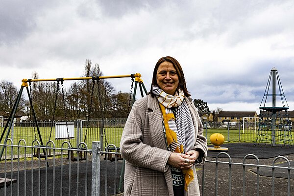 Mary Wade standing in front of childrens playpark