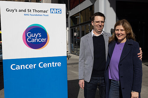 Rob and his wife pictured outside Guy's hospital