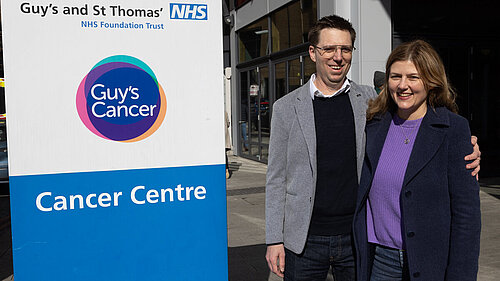 Rob and his wife pictured outside Guy's hospital