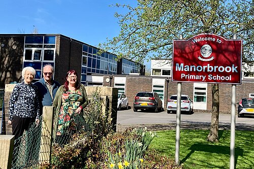 Cllr Maggie Tyrell, Cllr Chris Davies and Cllr Jayne Stansfield outside Manorbrook Primary School.   
