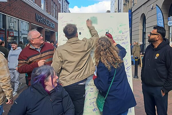 Giant Letter Signing