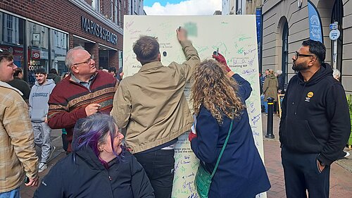 Ian Roome and Local Lib Dems campaign with Giant Letter in Barnstaple High Street