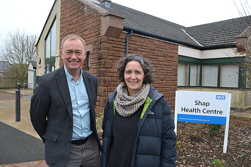 Tim outside Shap GP surgery with local councillor Nicki Vecqueray