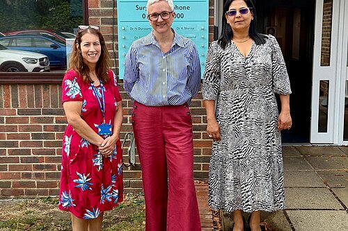 Alex standing outside Branksomewood Surgery with members of Hart Health Partnership's leadership team.