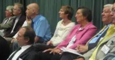 Group of Lib Dems listening to conference debate