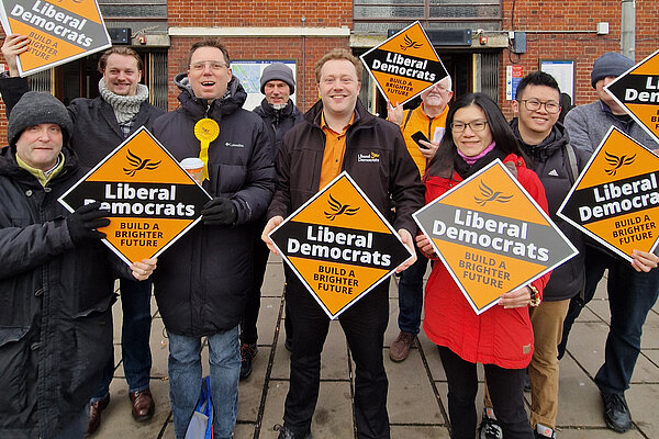 Charlie Clinton and a group of LibDems with diamonds.