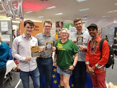 Mary Page and some young Green Lib Dems at the stall at Brighton 2018