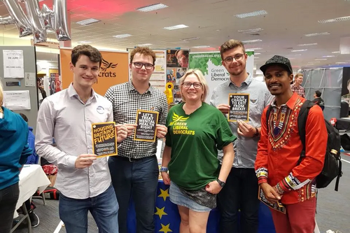 Mary Page and some young Green Lib Dems at the stall at Brighton 2018