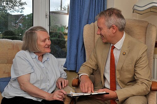 Gideon with pensioner 