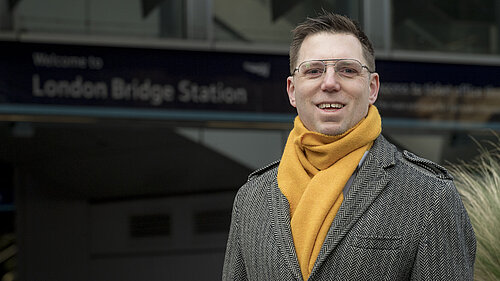 Rob Blackie pictured wearing a yellow scarf