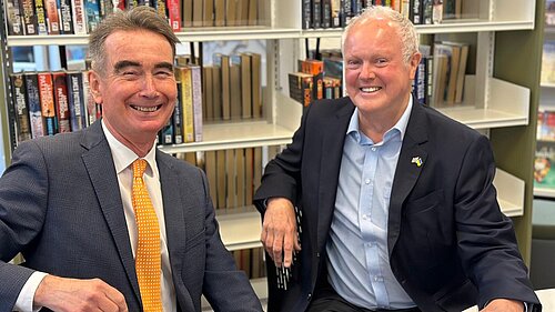 Clive and Stephen sitting in the library