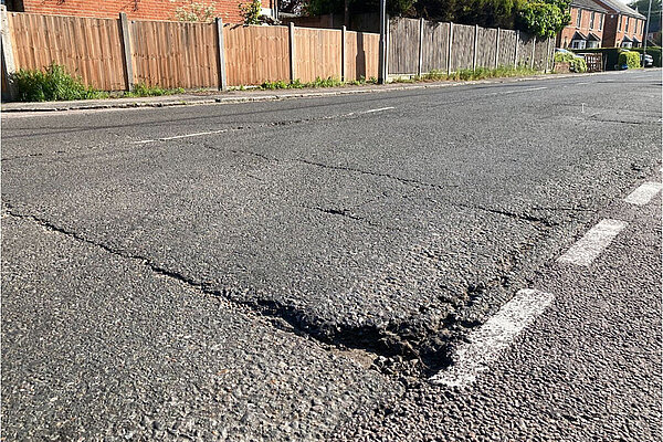 A damaged road surface