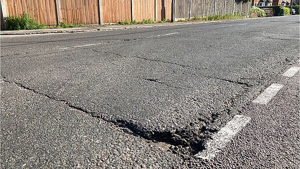 A damaged road surface