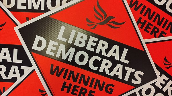 Pile of Lib Dem "Winning Here!" posters