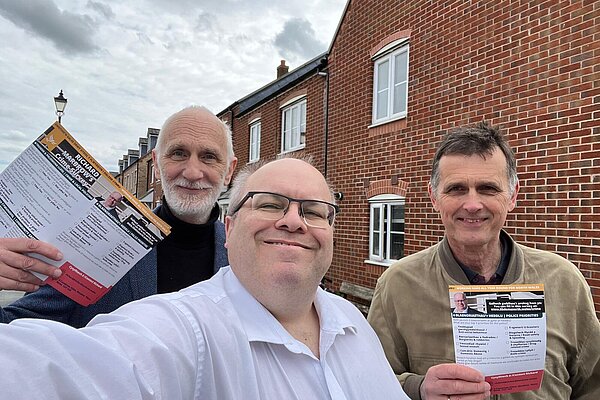 Selfie of campaigners delivering surveys