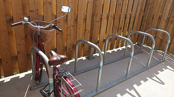 Single Bicycle in bike rack.