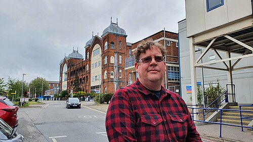 Arran Angus outside Whipps Cross Hospital