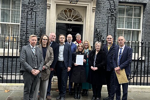 Ian and a group of people outside 10 Downing Street
