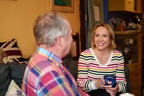 Helen smiling with local resident