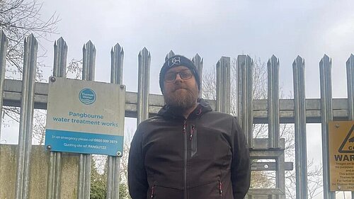 Cllr James Moore outside Thames Water treatment works.