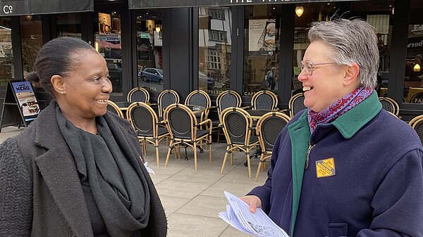 Janet and Nancy talking and smiling 