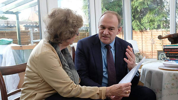 Ed with a local resident