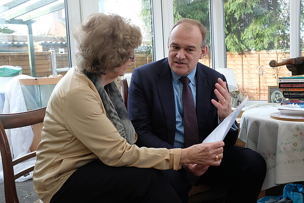 Ed Davey MP listening to a local resident