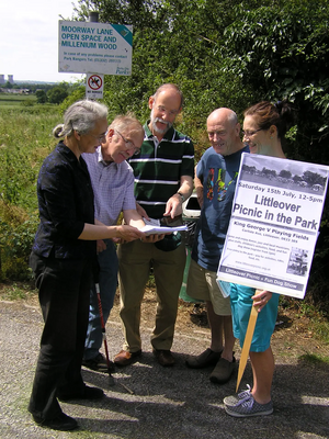 Cllrs Lucy Care, Eric Ashburner and Mike Carr with Nigel Staunton (centre) and Mandy Packham of Friends of Littleover Parks with a copy of the council report releasing the funding.