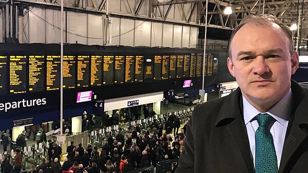 Ed at a train station