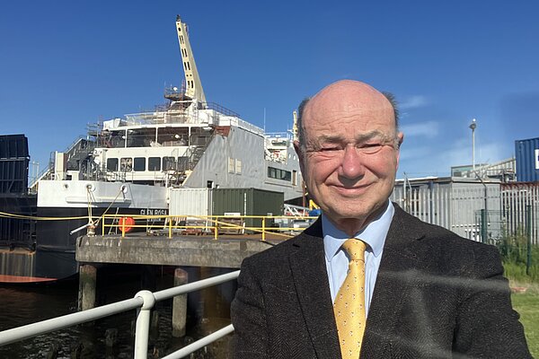 Alan in front of the Glen Rosa at Ferguson's shipyard
