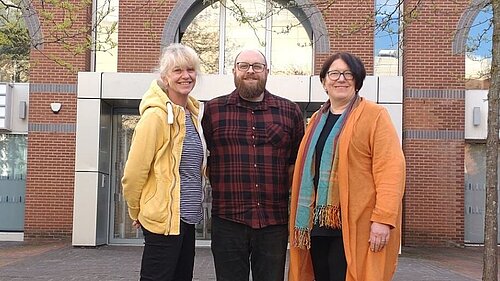 Reading Lib Dem councillors Meri O'Connell, James Moore, and Anne Thompson, outside the Reading Borough Council offices