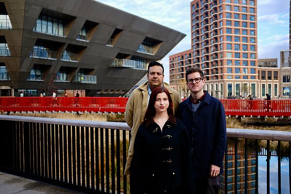 Vikas, Sorcha and JK looking angry at Canada Water