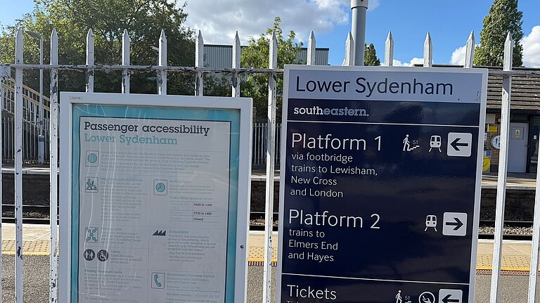 Signage with public information outside Lower Sydenham station