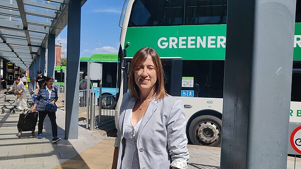 Jane Dodds MS in front of bus