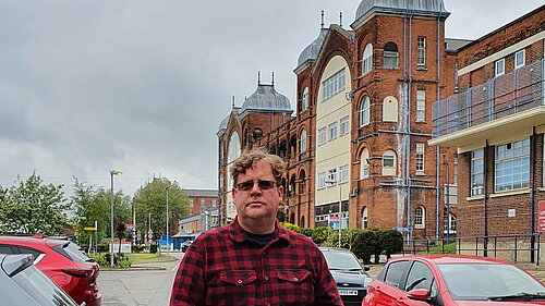 Arran Angus outside Whipps Cross Hospital
