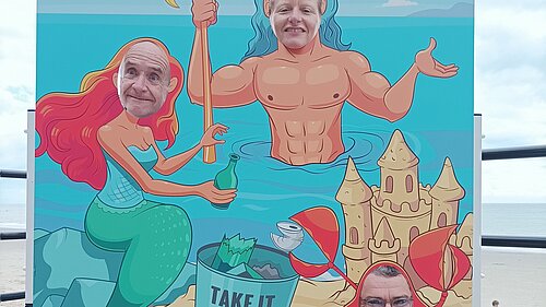 Jim Martin, Polly Blakemore and tim Prater with seaside board