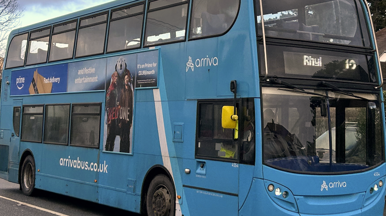 Close up of the side of an Arriva bus in Rhos on Sea