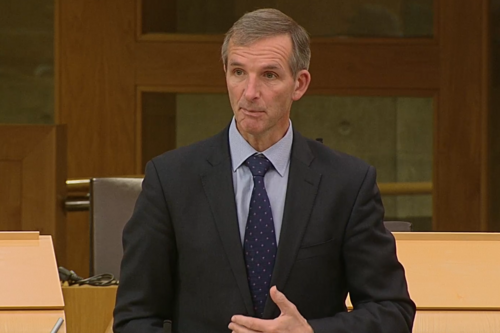 Liam speaks in debate