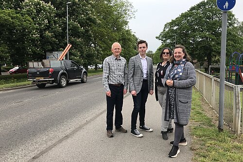 Lib Dem Councillors Nathan, Jo, Graham and Lucy standing by the Huntingdon Ring Road