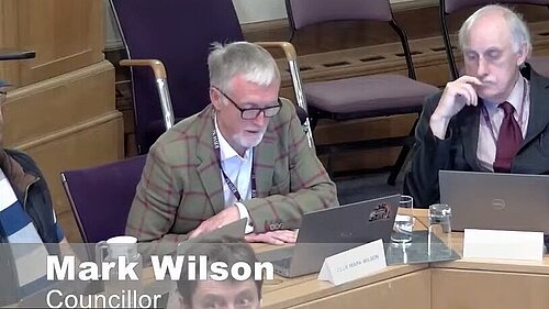 Cllr Wilson in council chamber